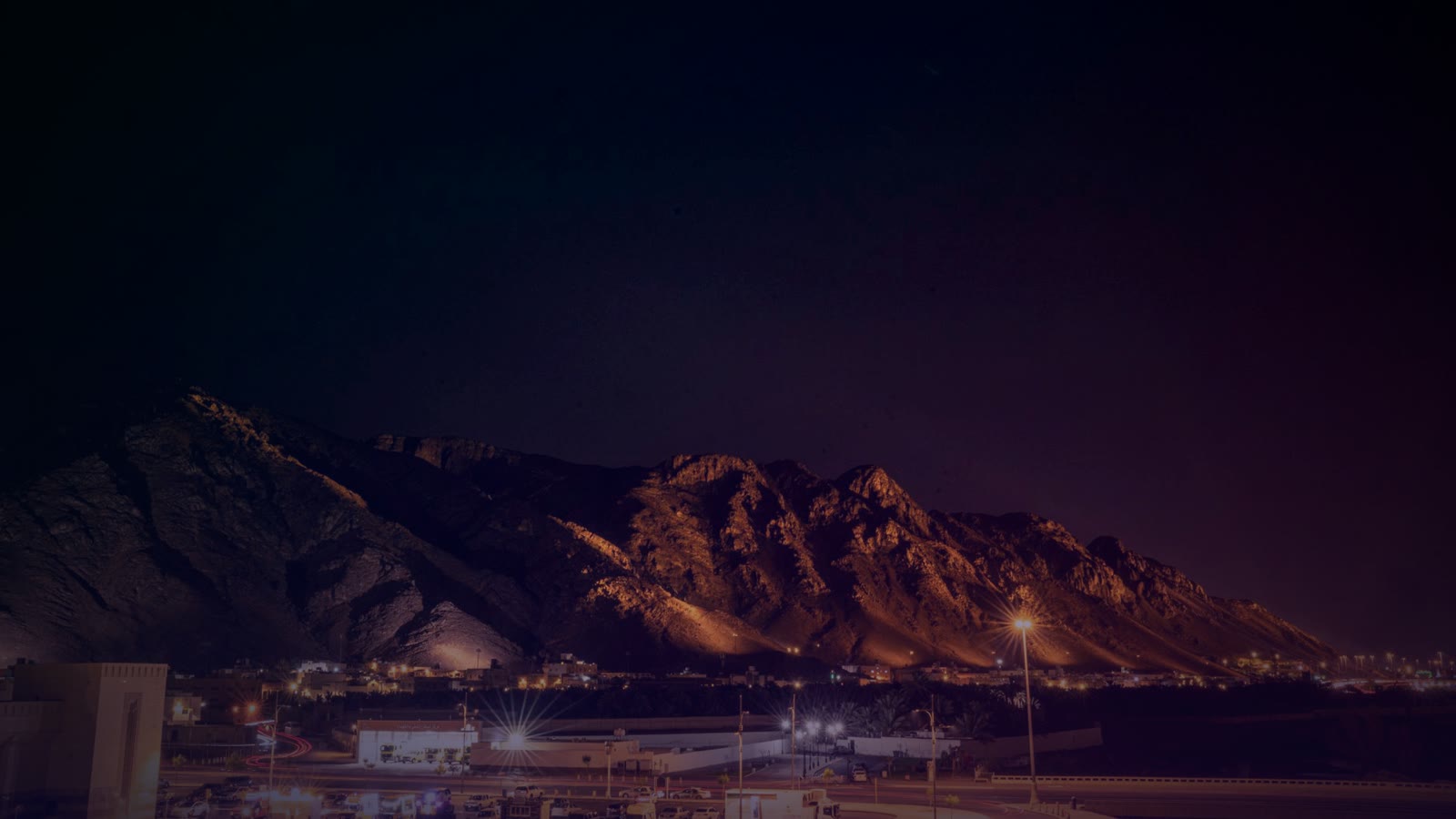 Beautiful night scene of Mount Uhud, Medina, Saudi Arabia, perfectly lit.
