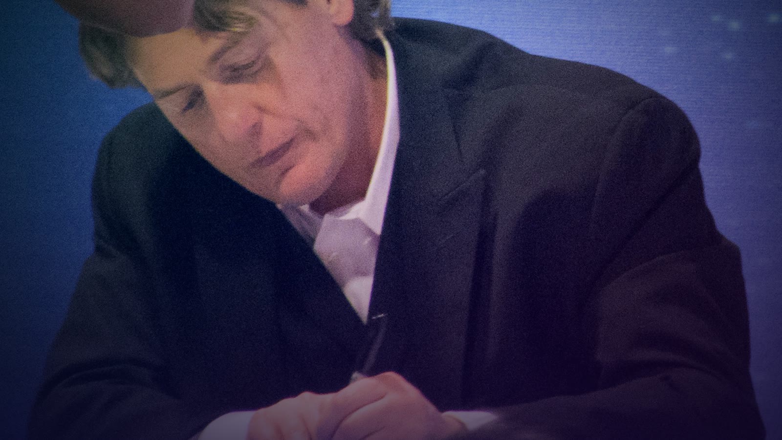 William Regal signing autographs for fans at WrestleMania 28