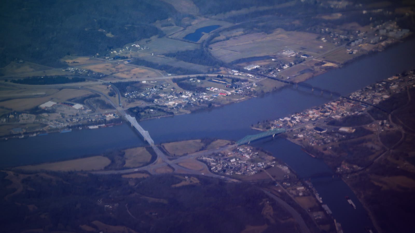 Aerial view of the Silver Memorial Bridge and Point Pleasant Rail Bridge over the Ohio River in 2019
