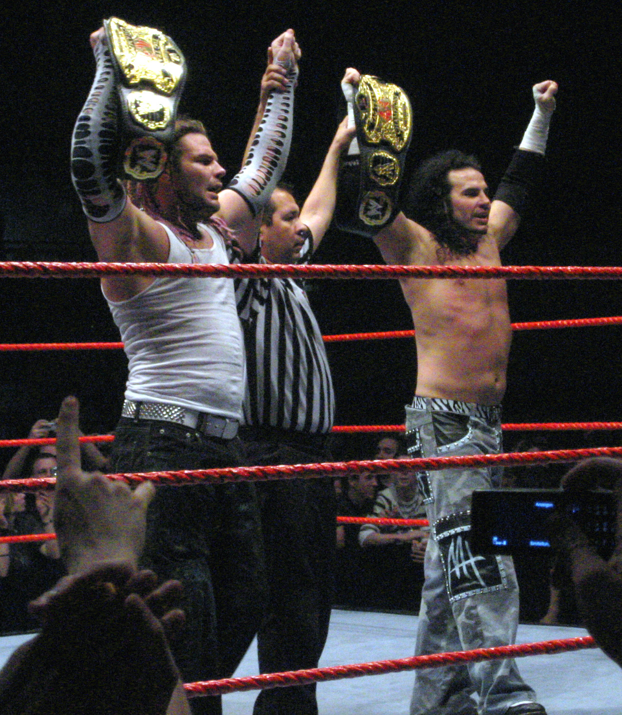 Jeff Hardy and Matt Hardy posing together as World Tag Team Champions