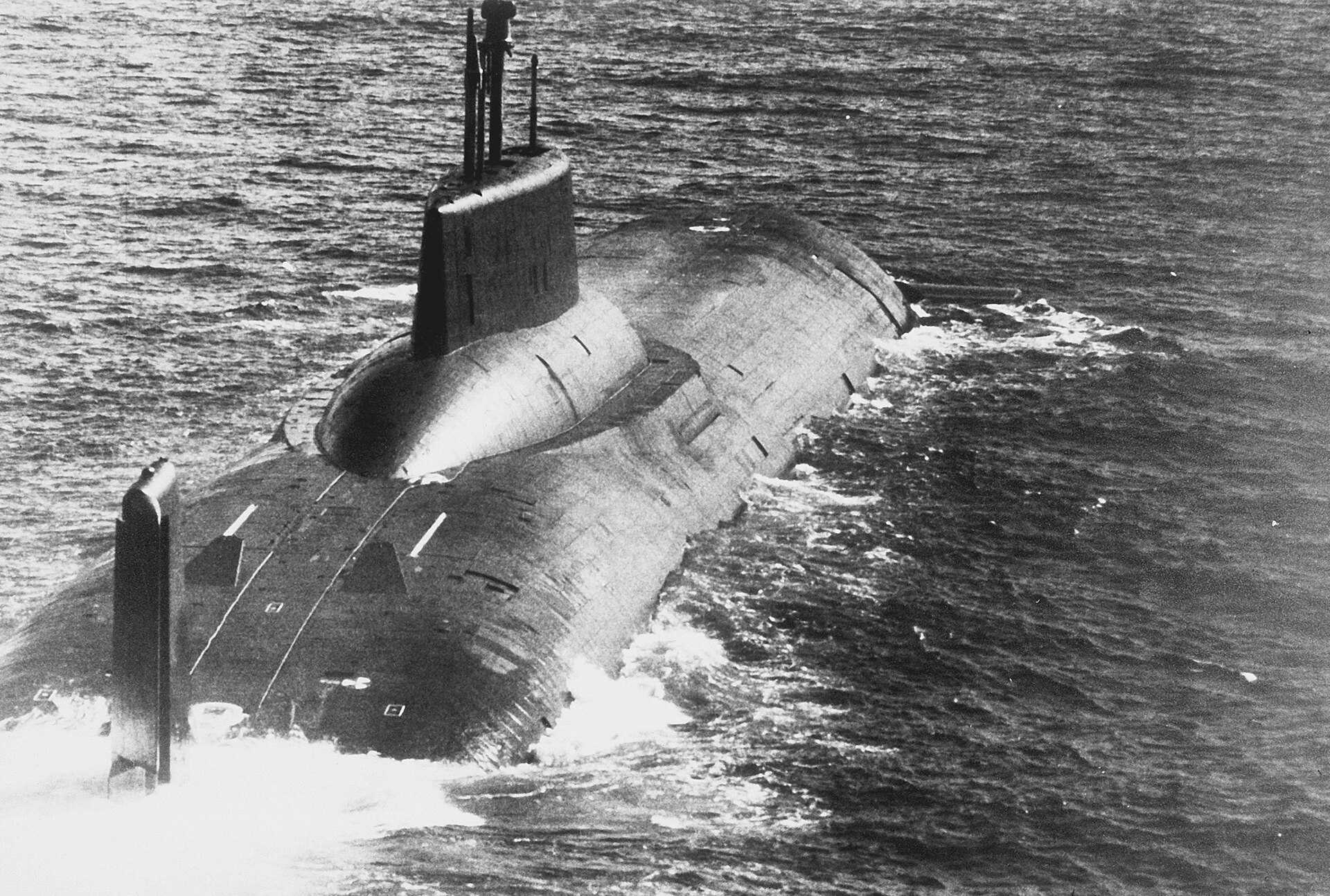 A Soviet Akula-class submarine photographed from the side while underway in the water