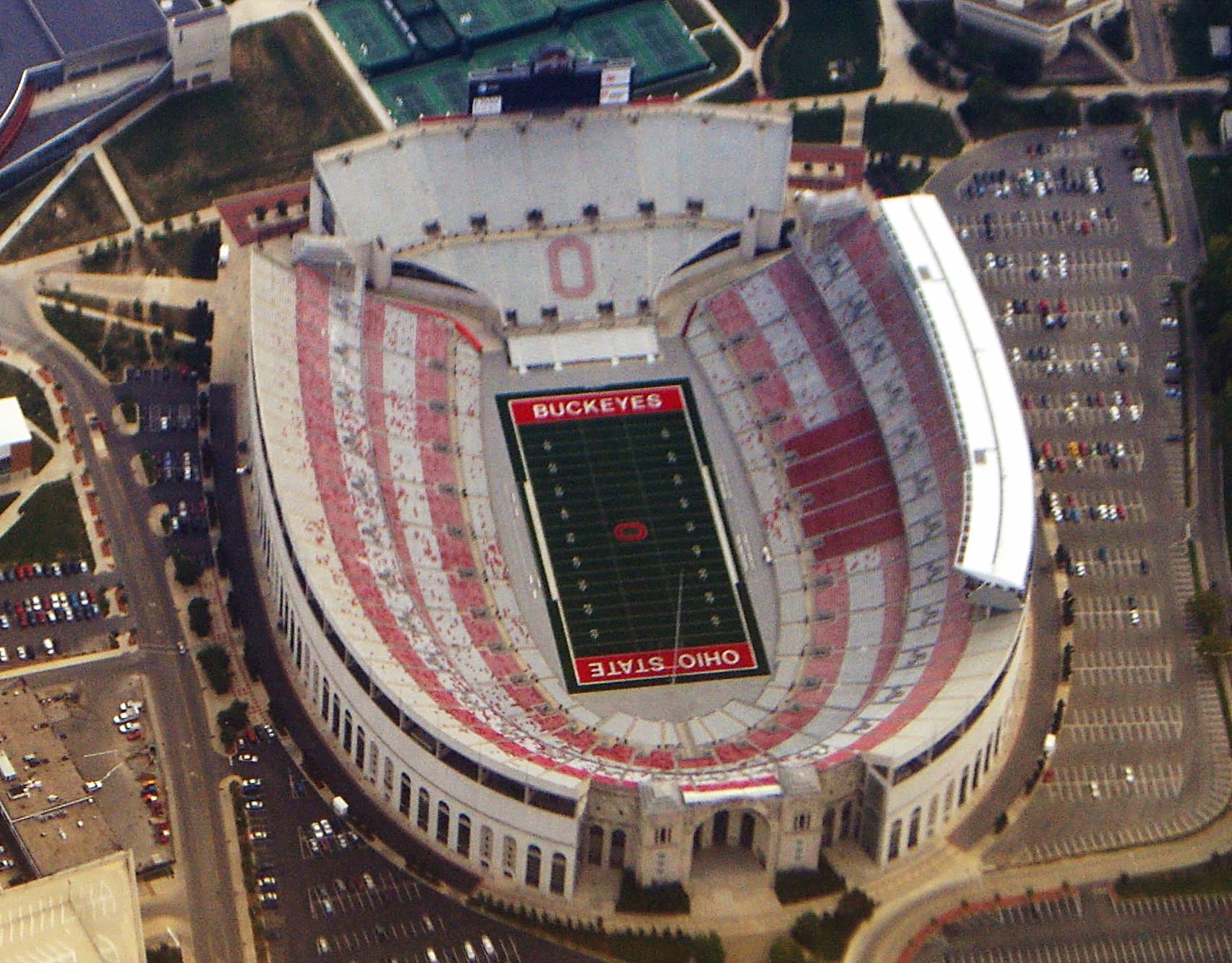 Ground-level photograph of Ohio Stadium, home of the Ohio State Buckeyes football team, showing the exterior of the stadium structure