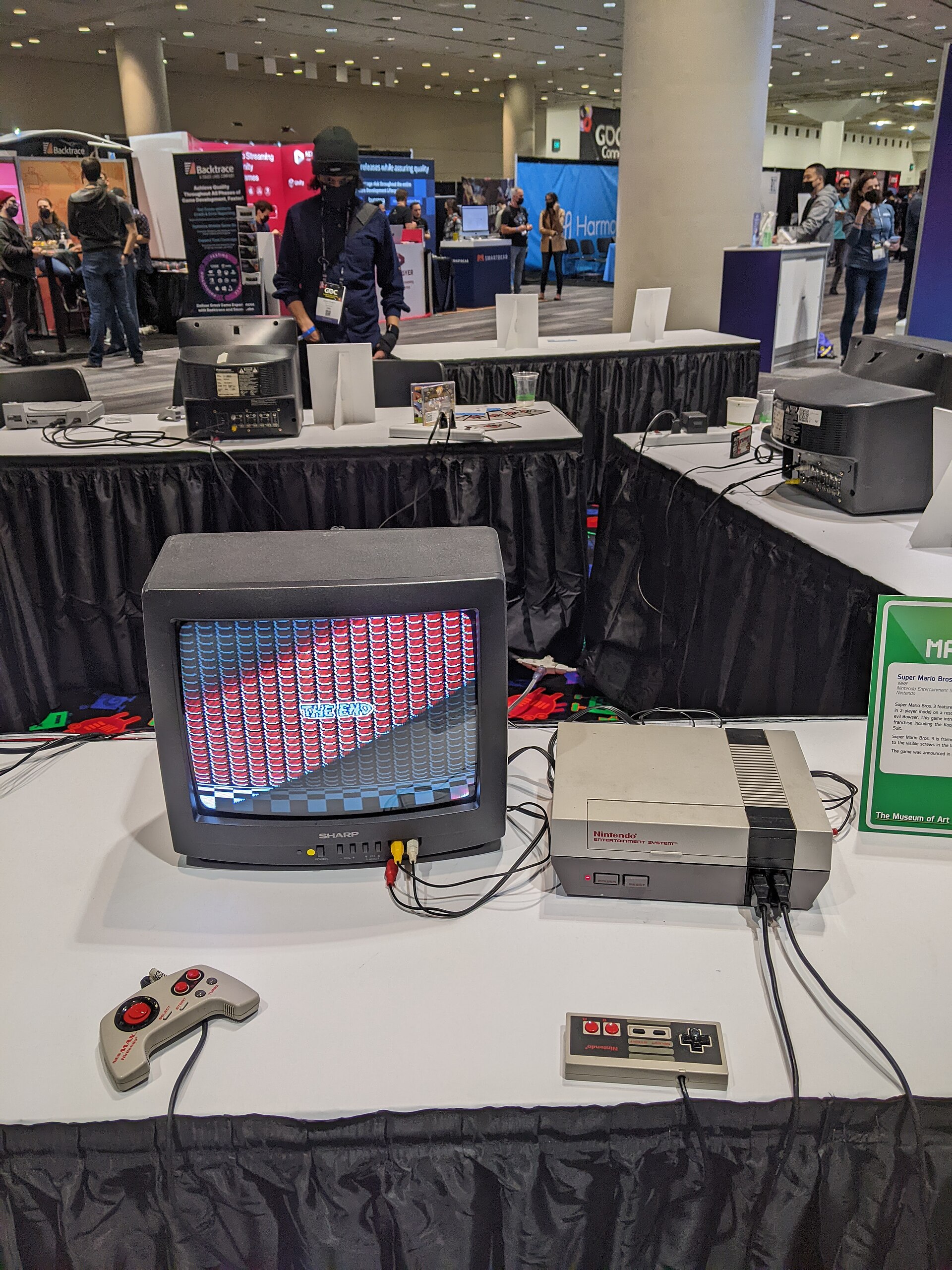 Super Mario Bros. 3 game displayed on a Nintendo Entertainment System console connected to a Sharp CRT television, showing the game in action