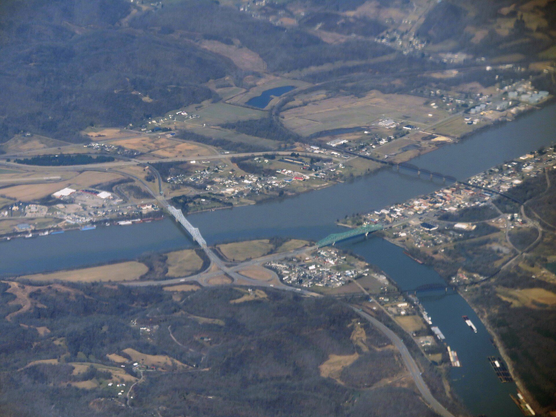 Aerial view of the Silver Memorial Bridge and Point Pleasant Rail Bridge over the Ohio River in 2019